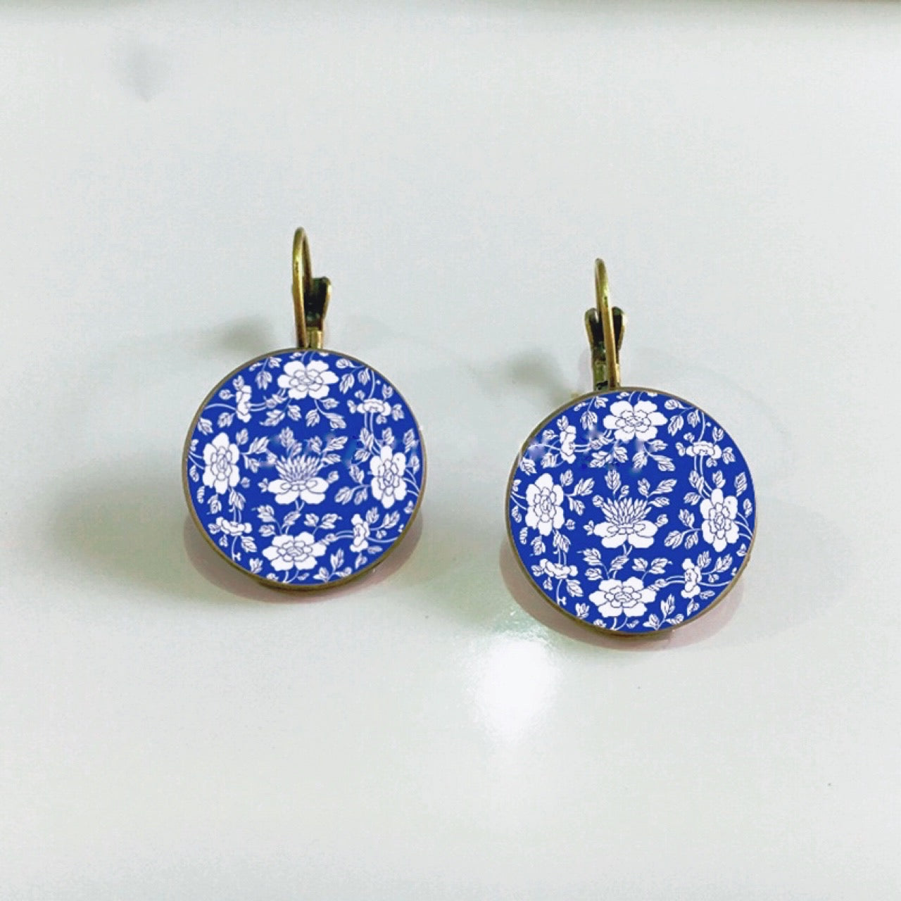 White Floral Cabochon Glass Earrings